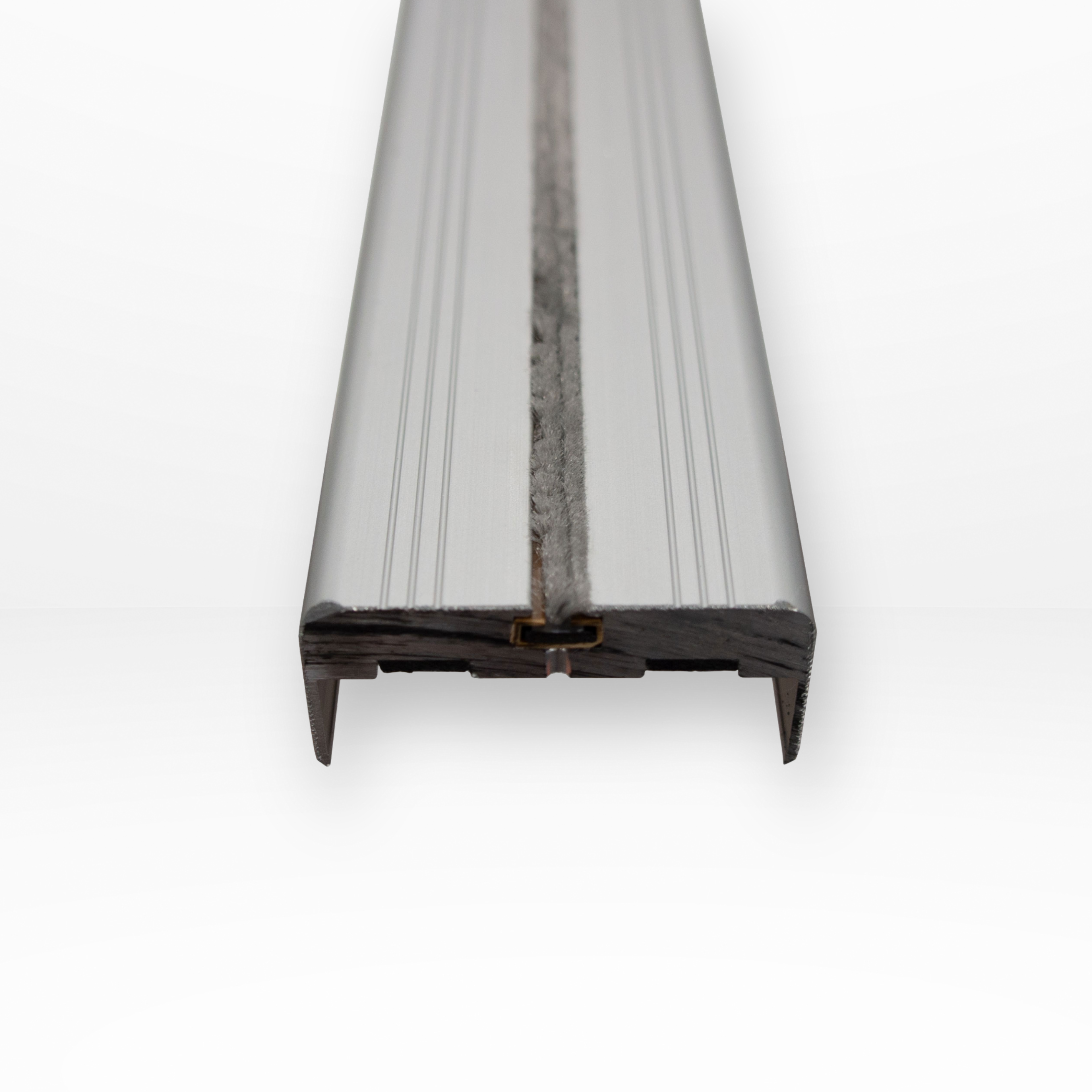 Close-up of a window seal strip on a white background